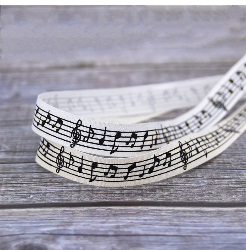 Nastro in cotone 10 metri con larghezza 15mm motivo a note musicali