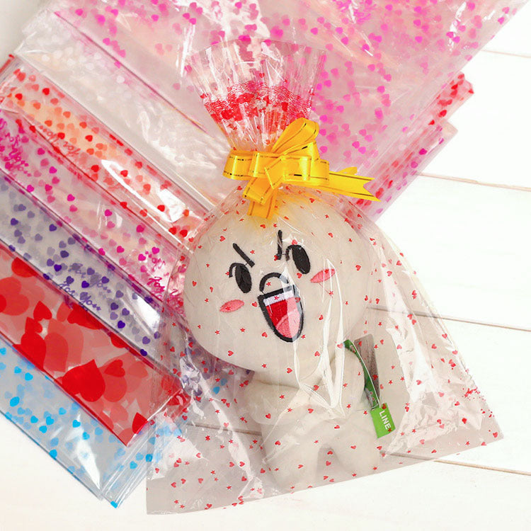 10 Rotoli di Cellophane Trasparente con Fantasie Colorate – 70cm x 2m ciascuno – Pellicola Decorativa per Regali, Fiori, Feste e Artigianato