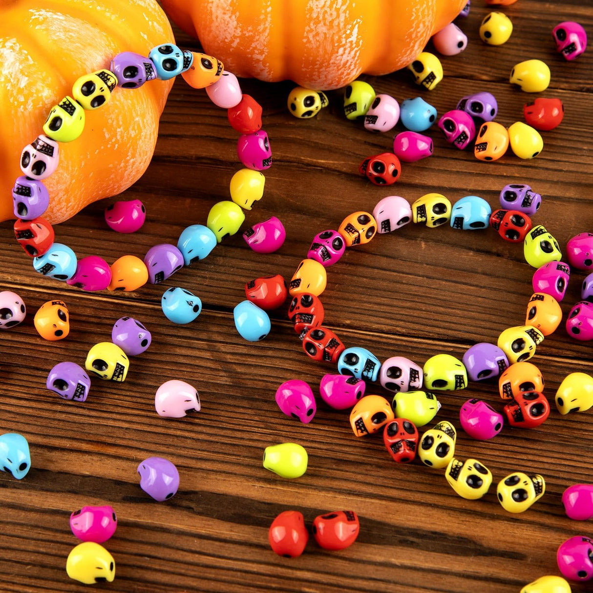 50 pezzi perline a forma di teschio in acrilico
