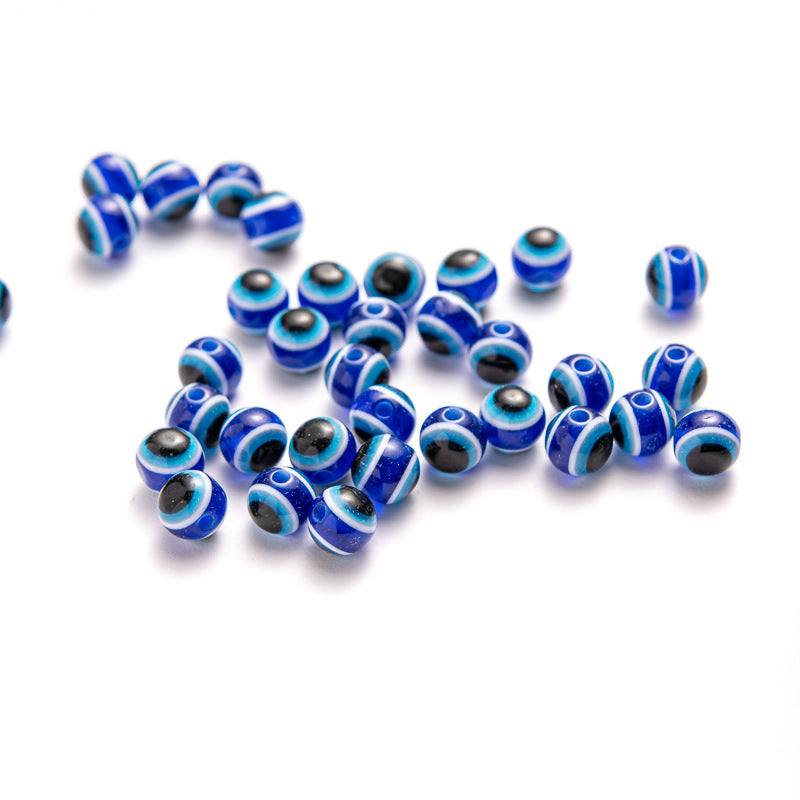 50 pezzi Perline Malocchio Rotondo in resina per la creazione di gioielli con foro