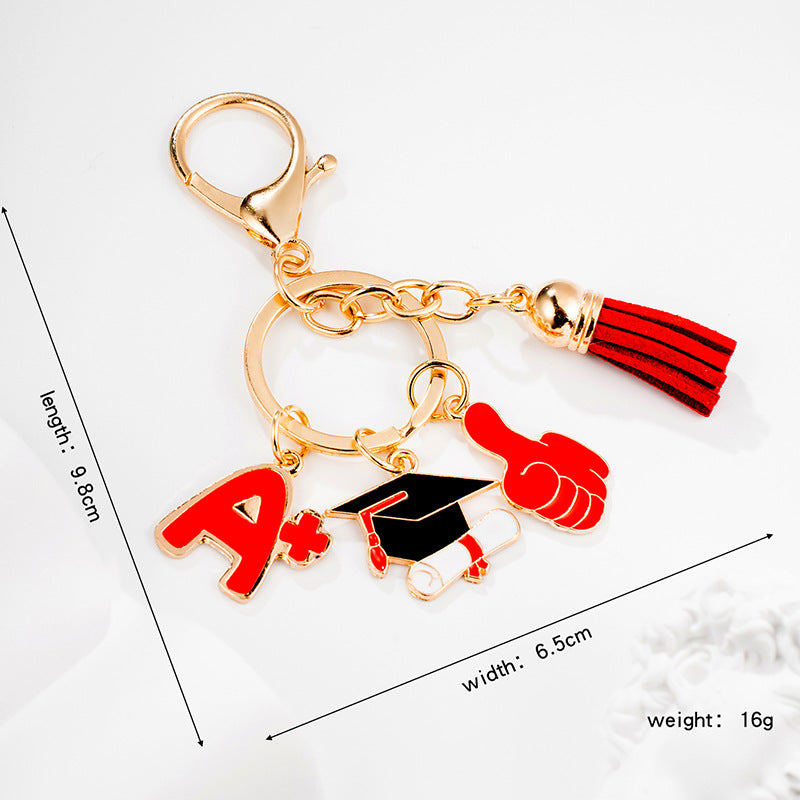 Portachiavi Laurea Cappello Pollice in Su Nappe Rosso