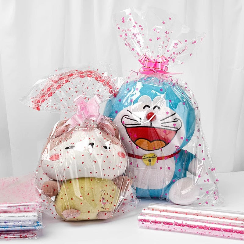 10 Rotoli di Cellophane Trasparente con Fantasie Colorate – 70cm x 2m ciascuno – Pellicola Decorativa per Regali, Fiori, Feste e Artigianato