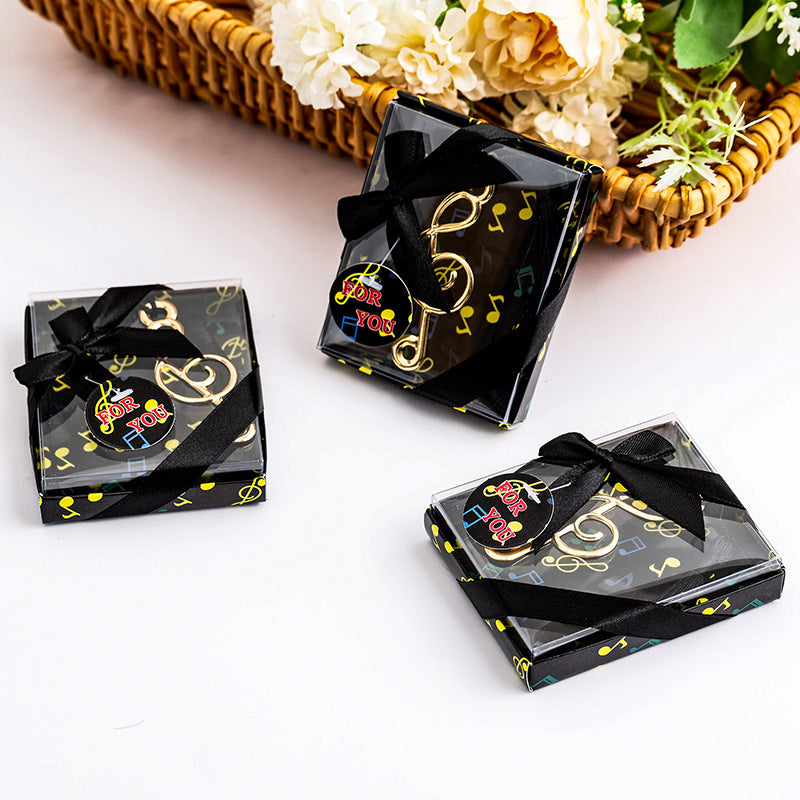 Segnalibro Oro Tema Musica Chiave di violino con nappe nero