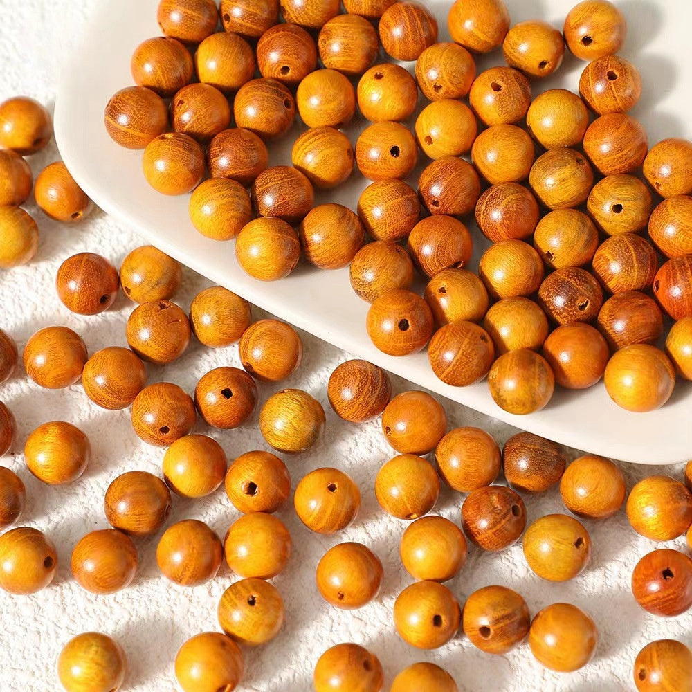100 pezzi Perline in legno di Sandalo Oro 10 mm